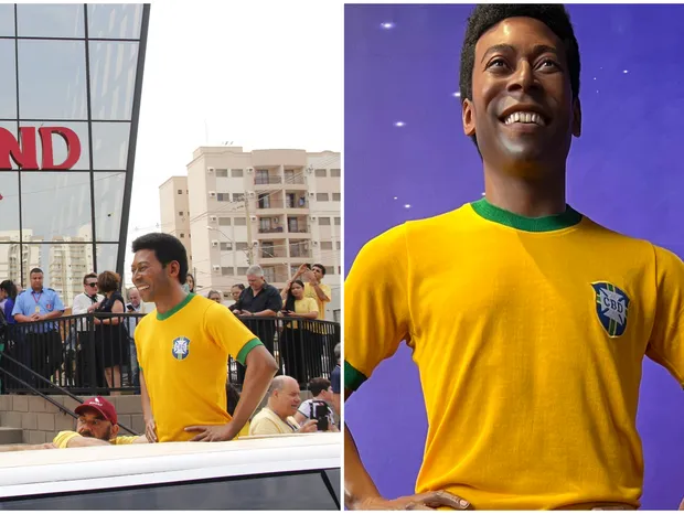 Visitante ao lado da estátua de cera de Ayrton Senna com macacão de corrida
